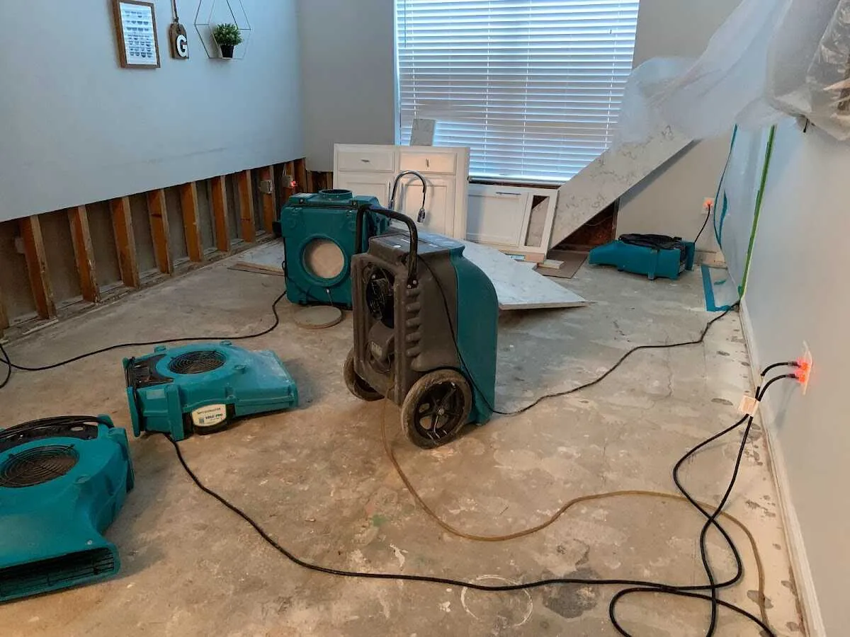 Dehumidifier in flood-cut room for Water Damage Restoration in Fountainebleau